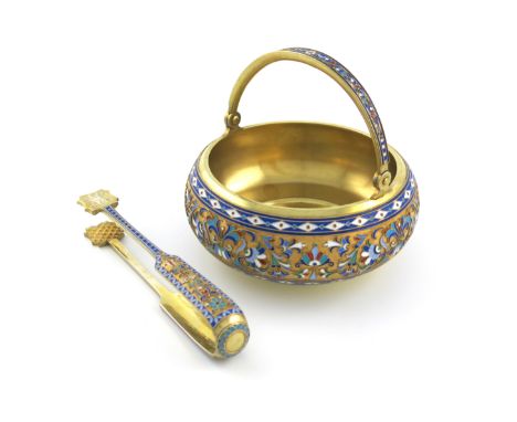 A Russian silver-gilt and enamel swing-handled basket and sugar tongs, by Ivan Saltykov, Moscow 1890, assay master A.P,  also