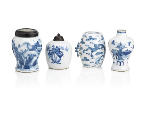 Three blue and white vases and one drum-shaped vesselQing DynastyA Kangxi period baluster vase decorated with precious object