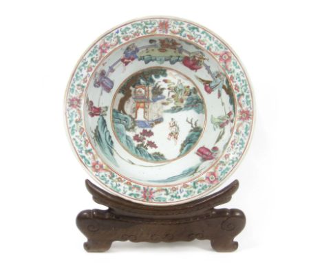 A famille rose basin19th centuryEnamelled to the central well with a mythical figural scene in landscape, the cavetto with a 