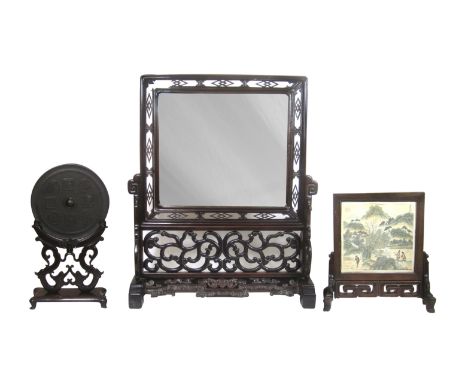 Two hongmu table screens together with a bronze mirror on standLate 19th/ early 20th centuryThe large example set with a late