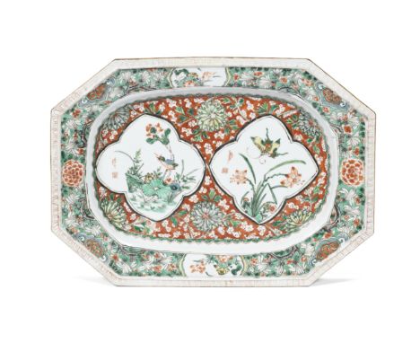 A famille verte octagonal trayKangxi periodRichly enamelled to the well with two quatrefoil cartouches enclosing a kingfisher