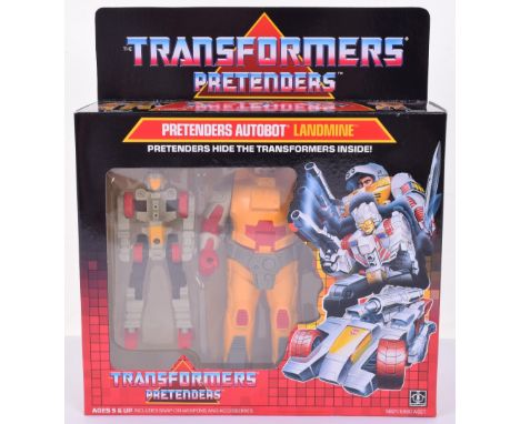 Boxed Hasbro G1 Transformers Pretenders Autobot Landmine 1987 issue,robot transforms to all terrain vehicle and back! In mint
