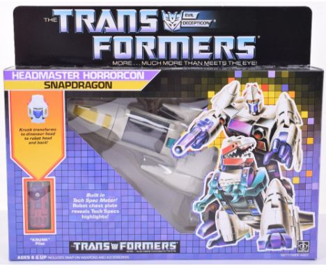 Boxed Hasbro G1 Transformers Headmaster Horrorcon ‘Snapdragon’ 1986 issue, transforms from jet to dinosaur to robot and back!