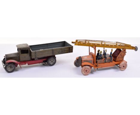 Tinplate Fire Escape and Tippco tipping wagon, fire escape with five seated firemen, ladder and Dunlop cord wheels, spring wo