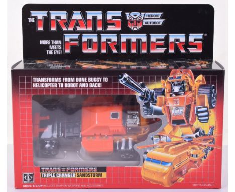 Boxed Hasbro G1 Transformers Triple Changer ‘Sandstorm’ 1986 issue, transforms from dune buggy to helicopter to robot and bac