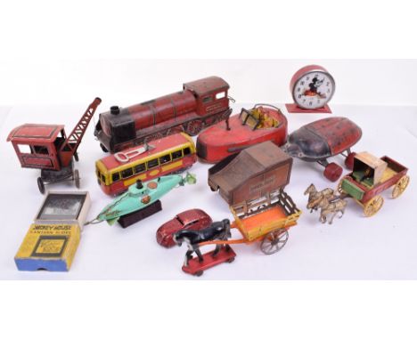 Various tinplate toys, French lithographed Nord locomotive and tender push along toy, 20” (51cm) long, poor condition, USA No