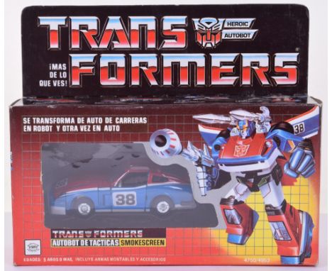 Boxed IGA G1 Transformers Autobot Tactician ‘Smokescreen’ 1985 Mexico issue, transforms from racecar to robot and back, in mi