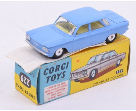 Corgi Toys 229 Chevrolet Corvair, pale blue body, yellow interior, flat spun wheel hubs, in very good to excellent condition,