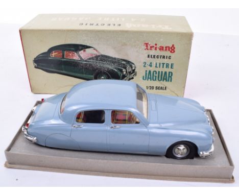 Tri-ang boxed 1/20 scale electric 2.4 litre Jaguar, light blue, silver trim, excellent condition, box good to fair, some rubb