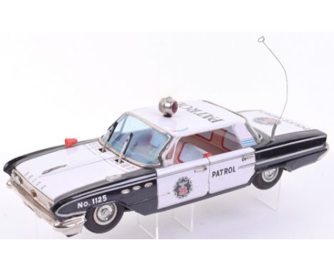 Nomura (Japan) Large Scale Tinplate Friction Drive  Buick Police Patrol car, black/white body, detailed tin printed interior,