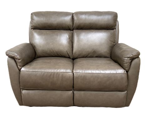 A modern dark brown leather reclining two seat sofa