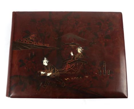 Japan Album of 34 hand-coloured albumen photographs of Japan, c. first quarter 20th century. Oblong 4to lacquered-case, photo