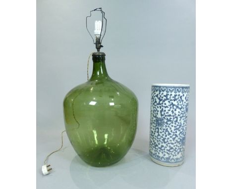 Victorian glass carboy converted to a lamp, 84cm H, and a Chinese blue and white stick stand. (2)