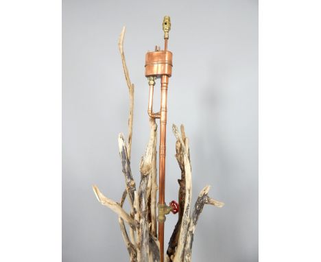 Leonardo Casey, driftwood standard lamp of organic form with central industrial style copper light tube, signed, 177cm H 
