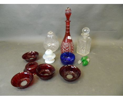 A quantity of ruby glass lamp sconces, a cut glass shade, cut glass decanter etc, 15'' high
