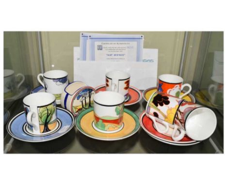 Seven Wedgwood Clarice Cliff limited edition cups and saucers; and a sugar bowl.