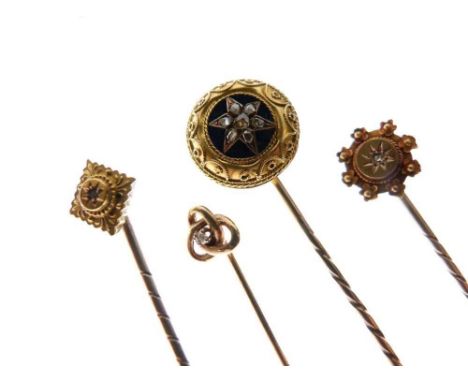 Rose diamond star stickpin, on an enamel ground, gold border, cased; with three other diamond set stickpins, one cased