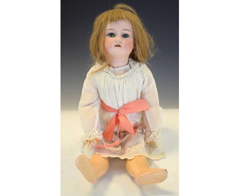 Early 20th Century bisque headed doll in a white dress, with pink bow. 'C 3' marked to back of neck, 49cm tall. Condition rep