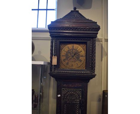 Joseph Atkinson longcase clock, having brass Roman chapter ring dial, case having later carving, 223cm high approx. 