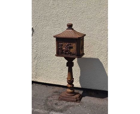 Cast iron post / letter box, having decorative panels, 111cm high approx.