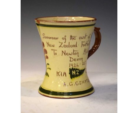 New Zealand Interest - Watcombe pottery mug, with decoration inscribed 'Souvenir of the visit of the New Zealand Football Tea