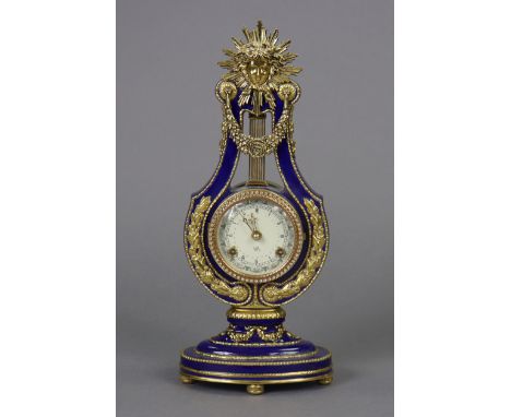 A V&amp;A museum reproduction ‘Marie Antoinette’ mantel clock of Lyre shape, with gilt mounts &amp; Roman dial, 39cm high x 1
