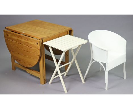 A pine drop-leaf kitchen table on square legs with plain stretchers, 80cm wide x 73cm high; together with a bar stool; a loom