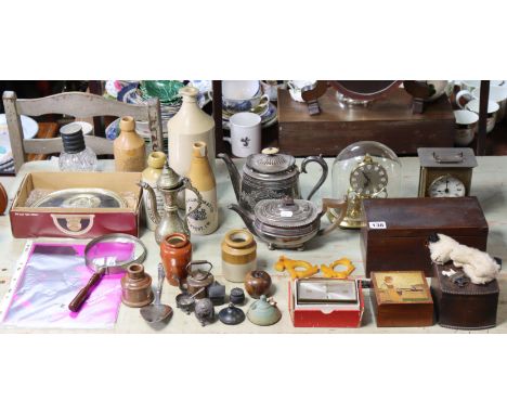 A Swiza electric alarm clock, boxed; together with three other clocks; three trinket boxes; a silver plated teapot; &amp; sun