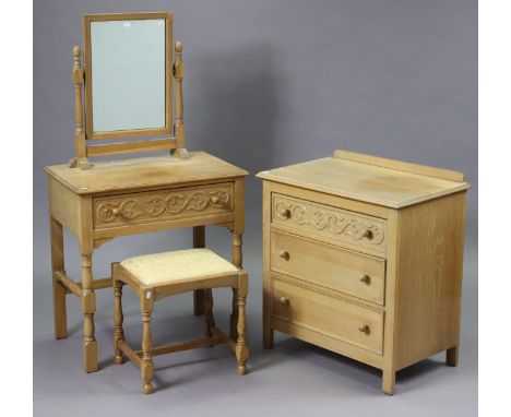 A light oak small chest fitted three long drawers with turned knob handles; &amp; a ditto dressing table, both 71.5cm wide, w