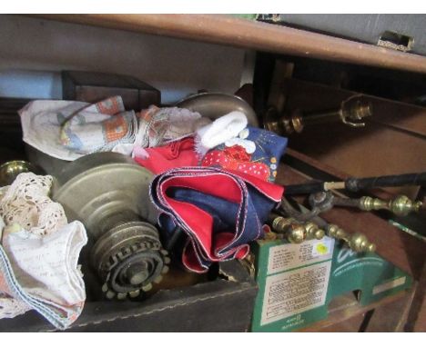 Two boxes of sundries to include linen, oil lamp, fire irons, wooden shelf, etc.