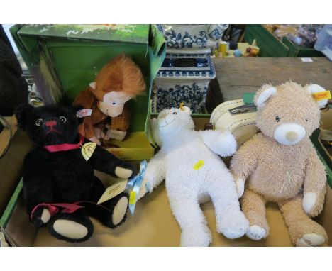 A Steiff Dodo in original packaging, together with three other Steiff bears and a suitcase