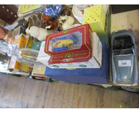 A model of an Austin Healey, together with a cased Royal Crown Derby jug and bowl, other model cars, and a decanter, commemor