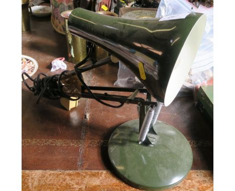 A green angle poise lamp