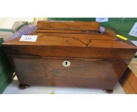 A 19th century rosewood tea caddy, with fitted interior