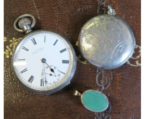 S Child, a silver cased open face pocket watch, together with a silver circular locket and a pendant