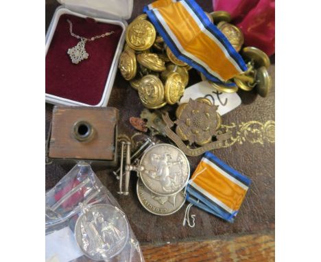 A collection of military buttons, cap badge and medals, the services medals engraved 112034 PNR. A. Fraser R.E and 10098 PTE.