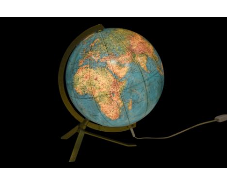 AN ILLUMINATED GLOBEIn German
An illuminated globe featuring German-language geographical details. This mid-20th-century piec