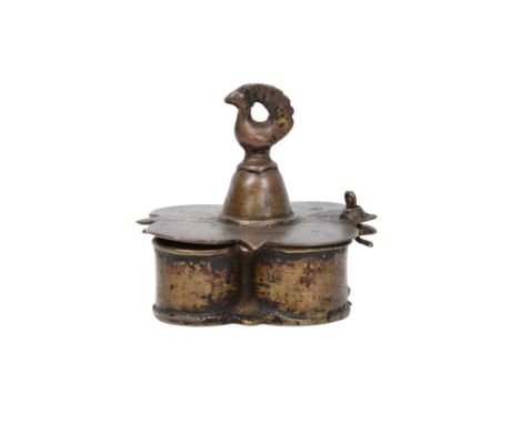 AN INDIAN BRASS SPICE CONTAINER WITH BIRDPossibly Deccan or Karnataka, Southern India, 19th century
The base of square shape 