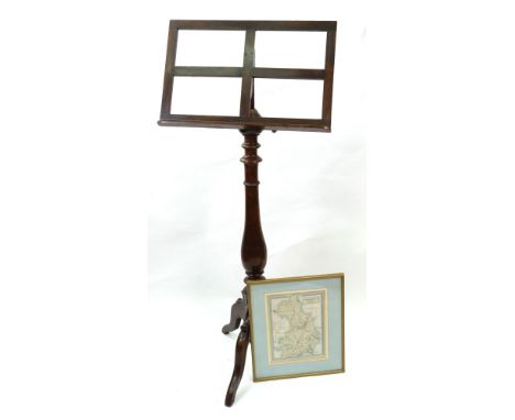 A Victorian style walnut music stand, with adjustable column, the baluster turned pillar, on a tripod base, 51cm wide, a Geor