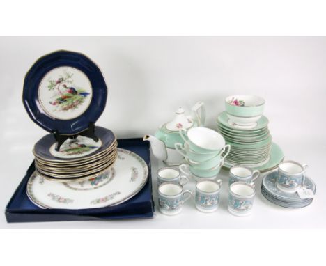 A Royal Worcester 'Miranda' pattern part tea service, six Wedgwood coffee cans and saucers, eleven Wedgwood dessert plates, p
