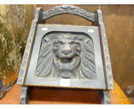 Vintage oak coal scuttle with lion mask carving to the front