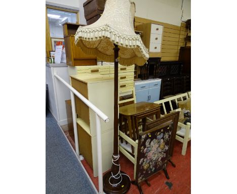 Vintage mahogany standard lamp and shade having a reeded column and carved detail