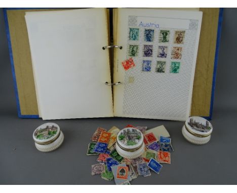 Small collection of vintage world stamps and three Ayshford china pill boxes depicting scenes of London