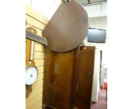 Vintage cricket table and a polished wood  cabinet with twin doors and castors