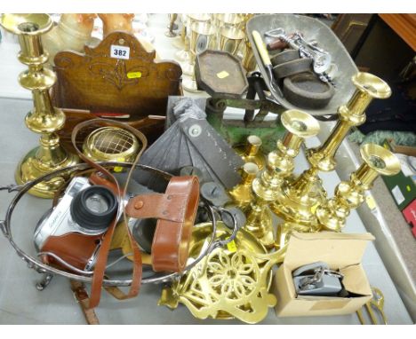 Pair of Victorian circular based brass candlesticks and others, a set of vintage cast iron scales with weights and other inte