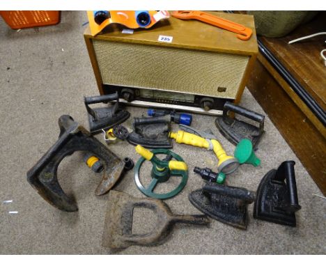 Vintage Ferranti radio, collection of vintage flat irons and a quantity of garden hose attachments etc