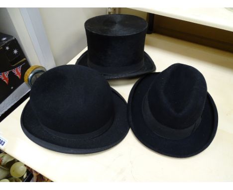 Vintage Exacta top hat along with a bowler hat and one other and three vintage brollies