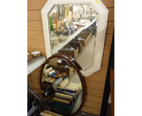Mahogany oval framed vintage mirror and a painted oak example