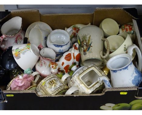 Box of vintage crockery including a Sadler teaset (teapot lid missing), a Victorian cow creamer (damaged) etc