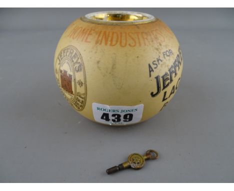Vintage match striker for Geoffreys Lager Beer by Wedekind & Co, London and a No. 6 pocket watch key